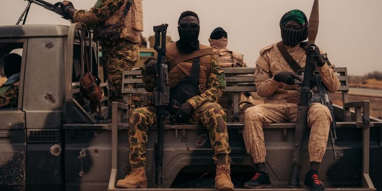 men in uniform attacking them