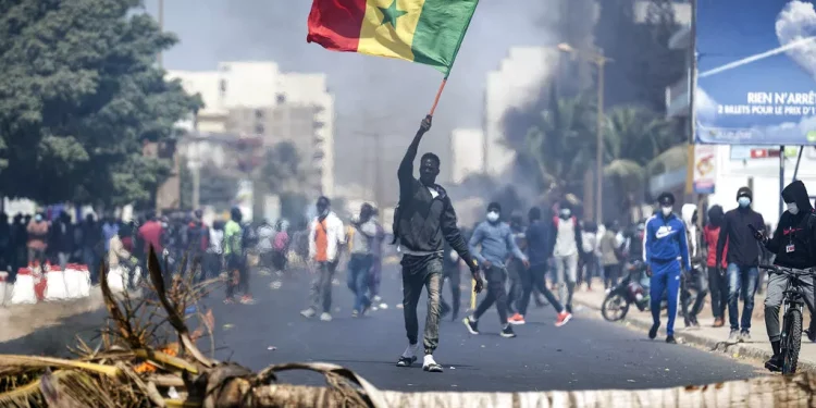 Police, protesters clash in Senegal over postponement of presidential polls