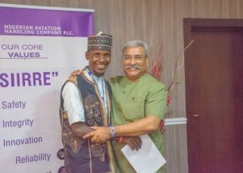 Cleaner who returned $10,000 found in aircraft gets cash reward, double promotion